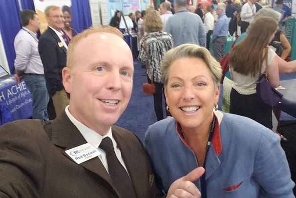 IFPG President Red Boswell with the CEO of Neighborly, Dina Dwyer-Owens