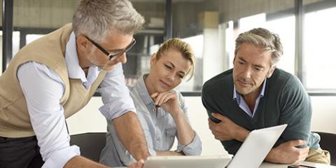 conference room meeting with 3 people